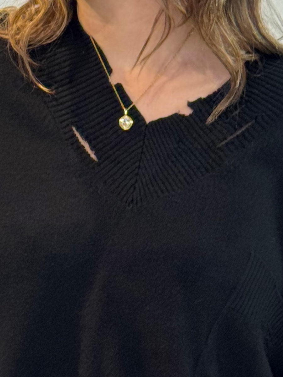 La Vaca Loca Apice jumper showing distressed V neckline