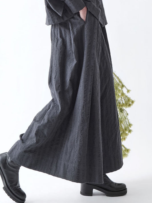 Soh side detail of cotton check culottes showing broad cropped legs
