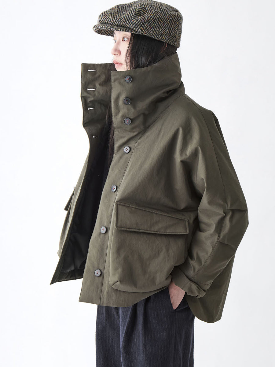 Soh front view of khaki padded jacket with large flap pockets