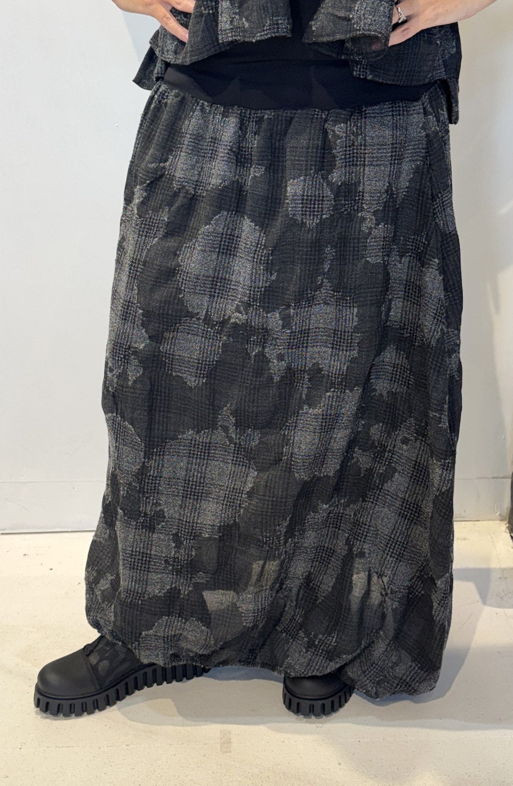 Front view of the Igor Dobranic Freesia grey checked skirt showing its ankle-length silhouette