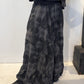 Side view of the Freesia skirt showing soft folds and its gently flared shape