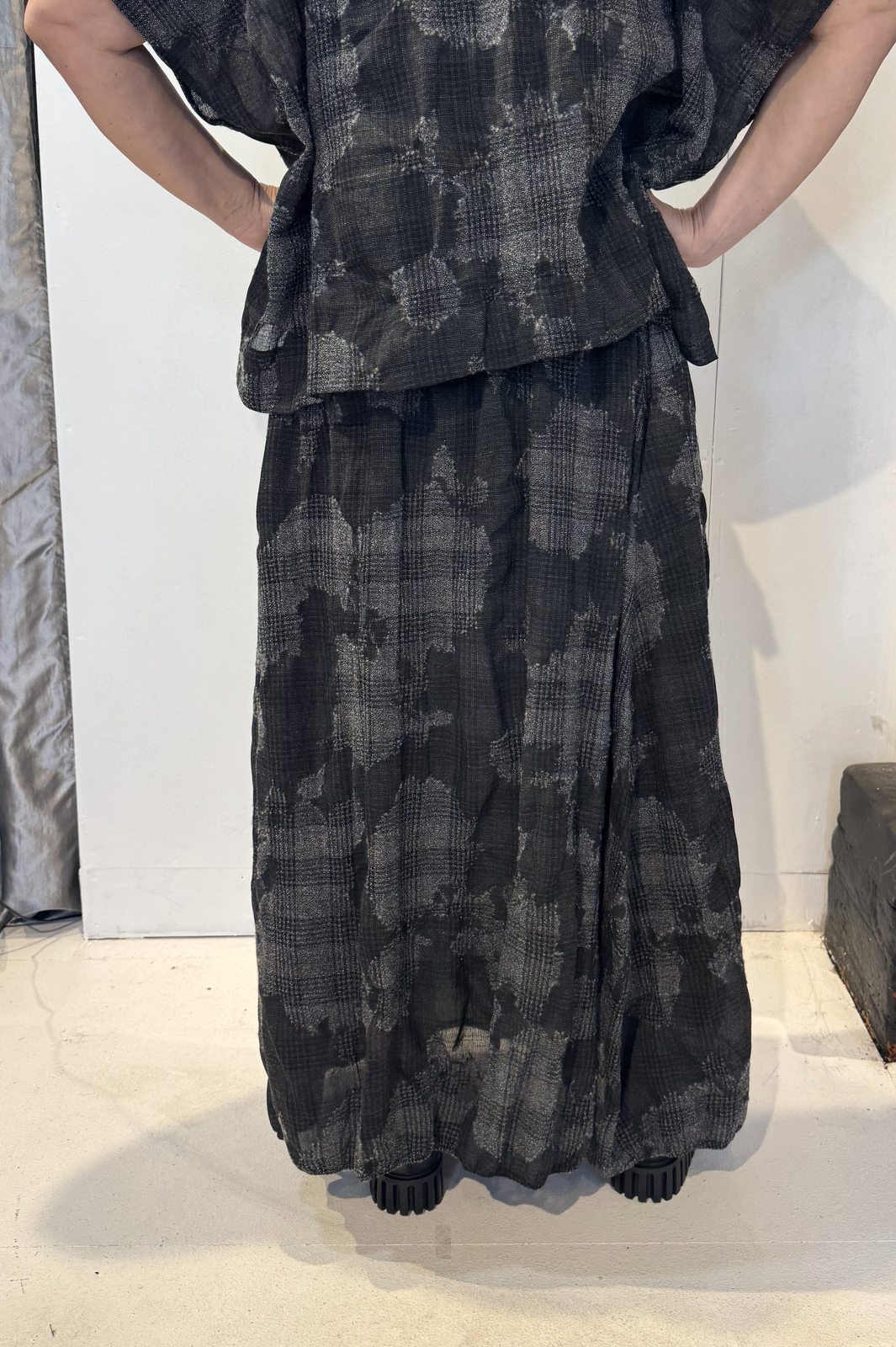 Back view of the Freesia grey and charcoal checked long skirt