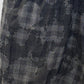 Close-up of the Freesia skirt showing its textured checked weave