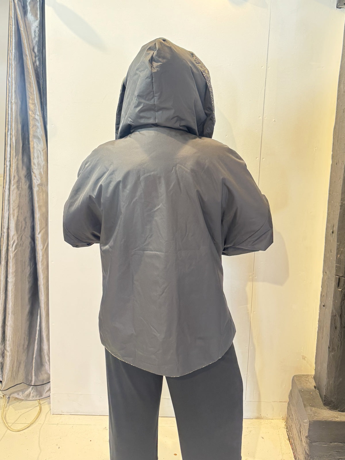 Igor Dobranic Hibiscus reversible jacket: plain black back with hood up