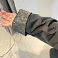 Igor Dobranic Hibiscus reversible jacket: turned cuff showing the green patterned reverse