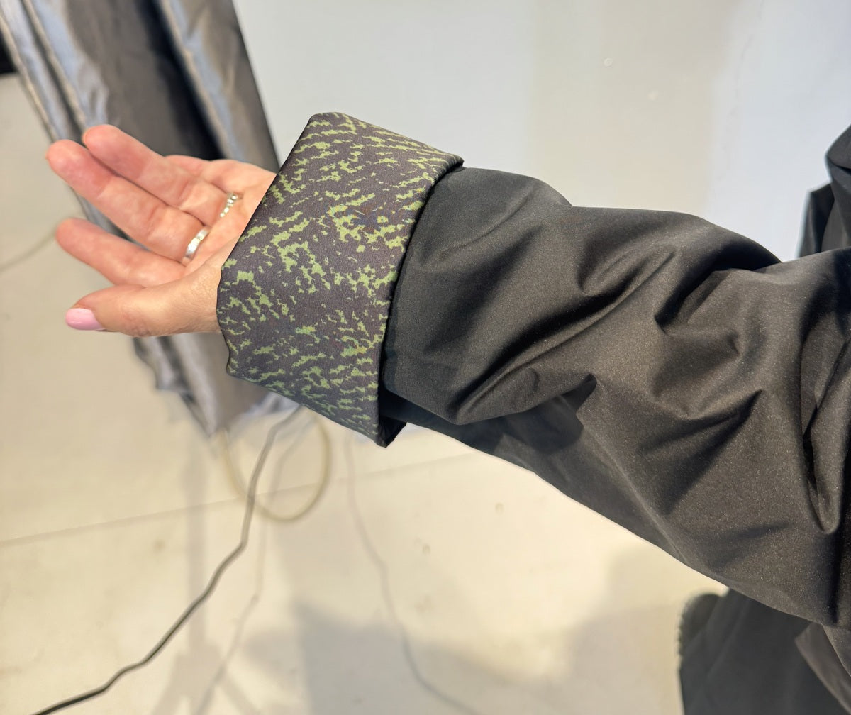 Igor Dobranic Hibiscus reversible jacket: turned cuff showing the green patterned reverse