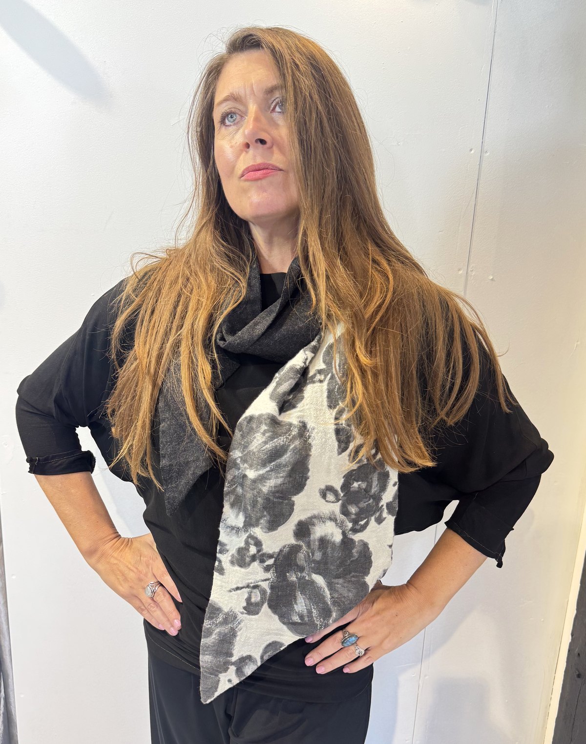 Closer view of the Imortelle scarf showing its floral panel and angled end