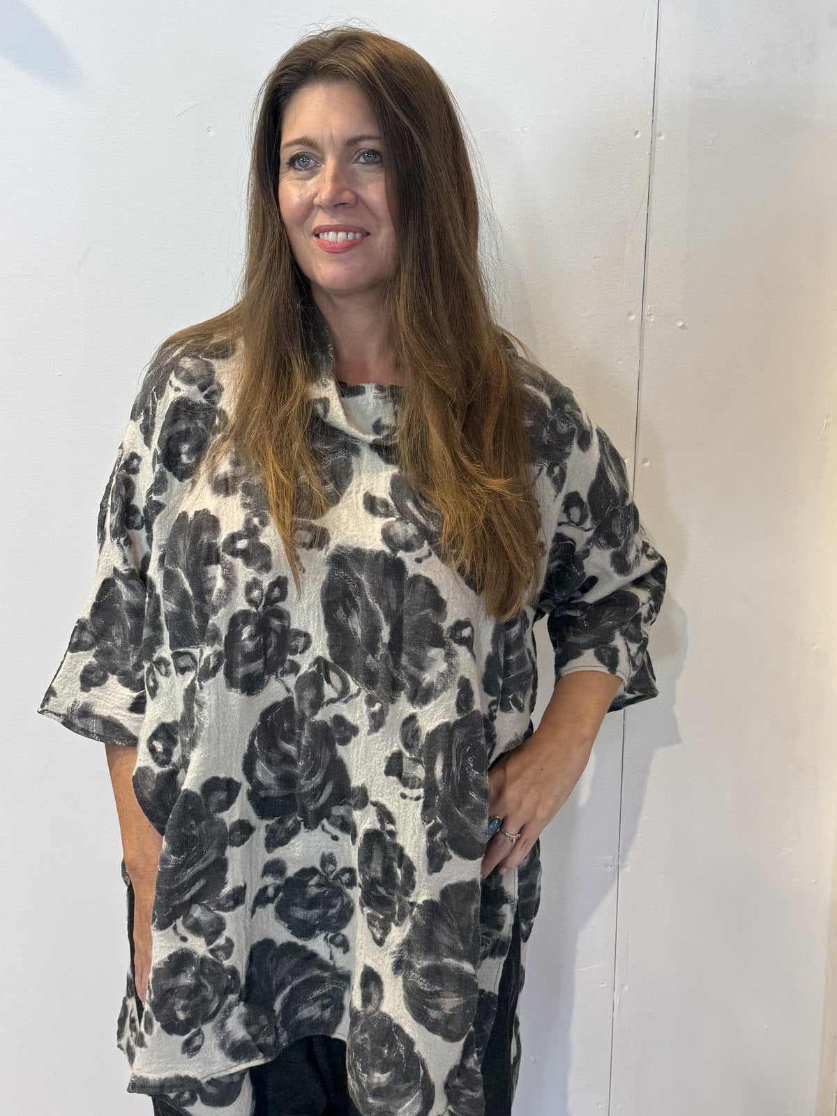 Front view of the Igor Dobranic Lantana grey floral tunic with an uneven hem