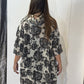 Back view of the Lantana tunic in grey and charcoal florals