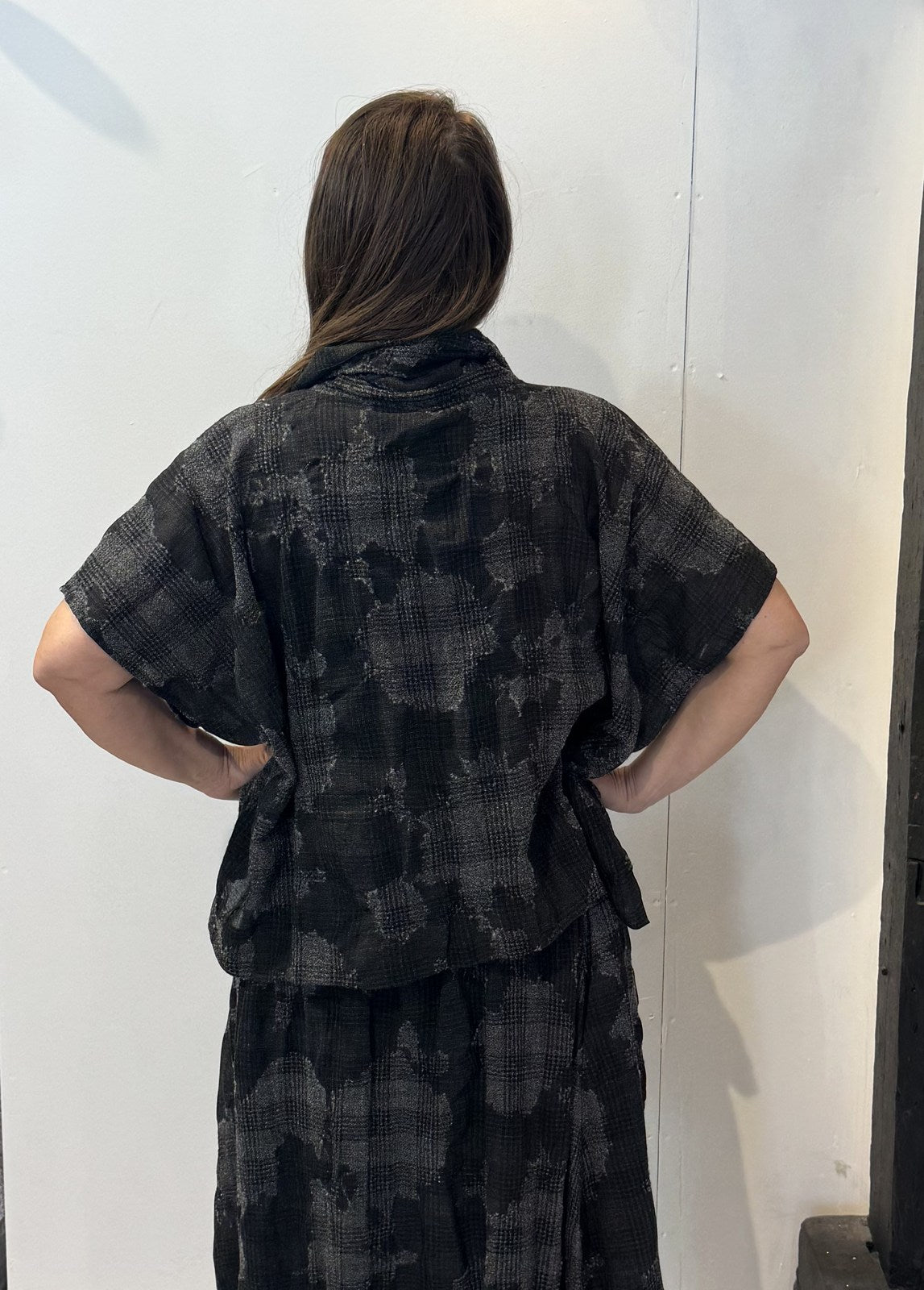 Back view of the Lotus waistcoat in grey and charcoal checks