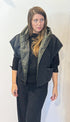 Front view of the Igor Dobranic Pensy reversible waistcoat showing the plain black side and green patterned collar