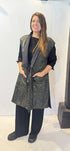 Front view of the Igor Dobranic Rue waistcoat showing its black and green pattern and black lapels