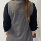 Back view of the Senna grey pinstriped waistcoat showing its long sleeveless silhouette