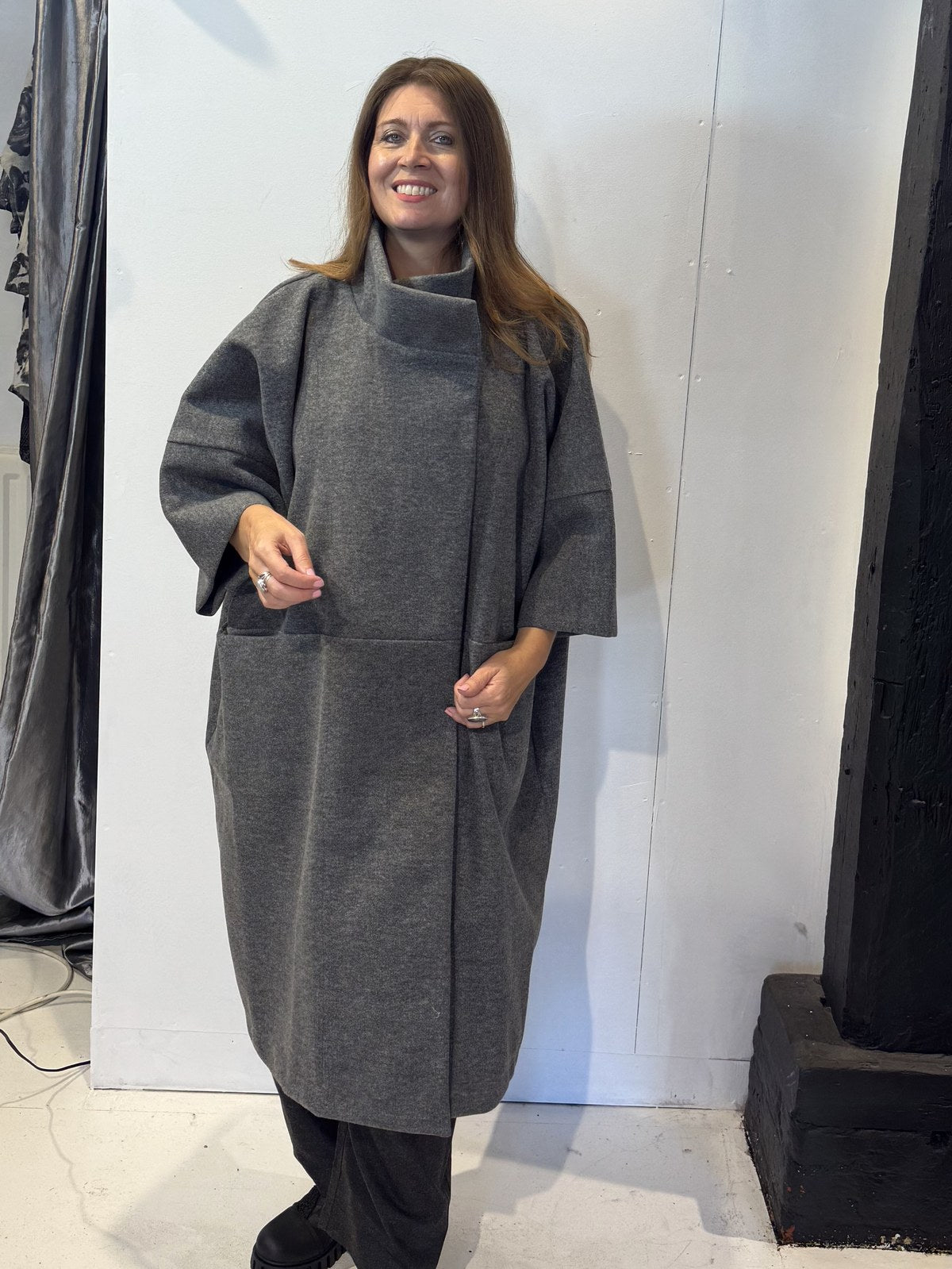 Front view of the Igor Dobranic Sorrel grey coat with its collar raised