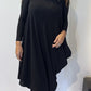 Front view of the Igor Dobranic Strelizia black dress showing its draped asymmetric hem