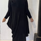 Back view of the Strelizia black dress showing its uneven hem