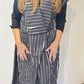 Front view of the Igor Dobranic Tulip black and white long waistcoat showing broad lapels and angular front edges