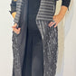 Front view of the Tulip black and white waistcoat worn open, showing its broad lapels