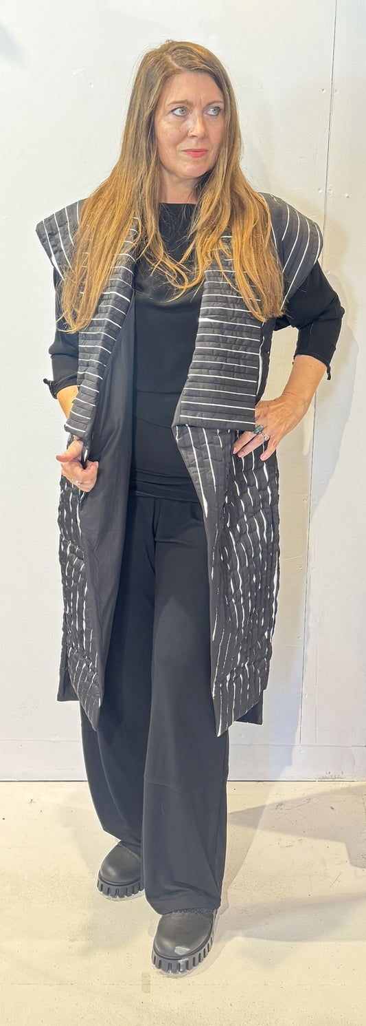 Front view of the Tulip black and white waistcoat worn open, showing its broad lapels