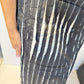 Close-up of the Tulip waistcoat showing its raised, rippled black and white striped texture
