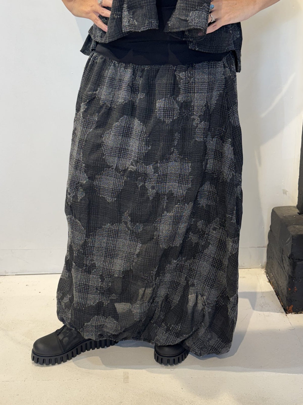 Front view of the Igor Dobranic Freesia grey checked skirt showing its ankle-length silhouette