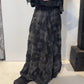 Side view of the Freesia skirt showing soft folds and its gently flared shape