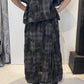 Back view of the Freesia grey and charcoal checked long skirt