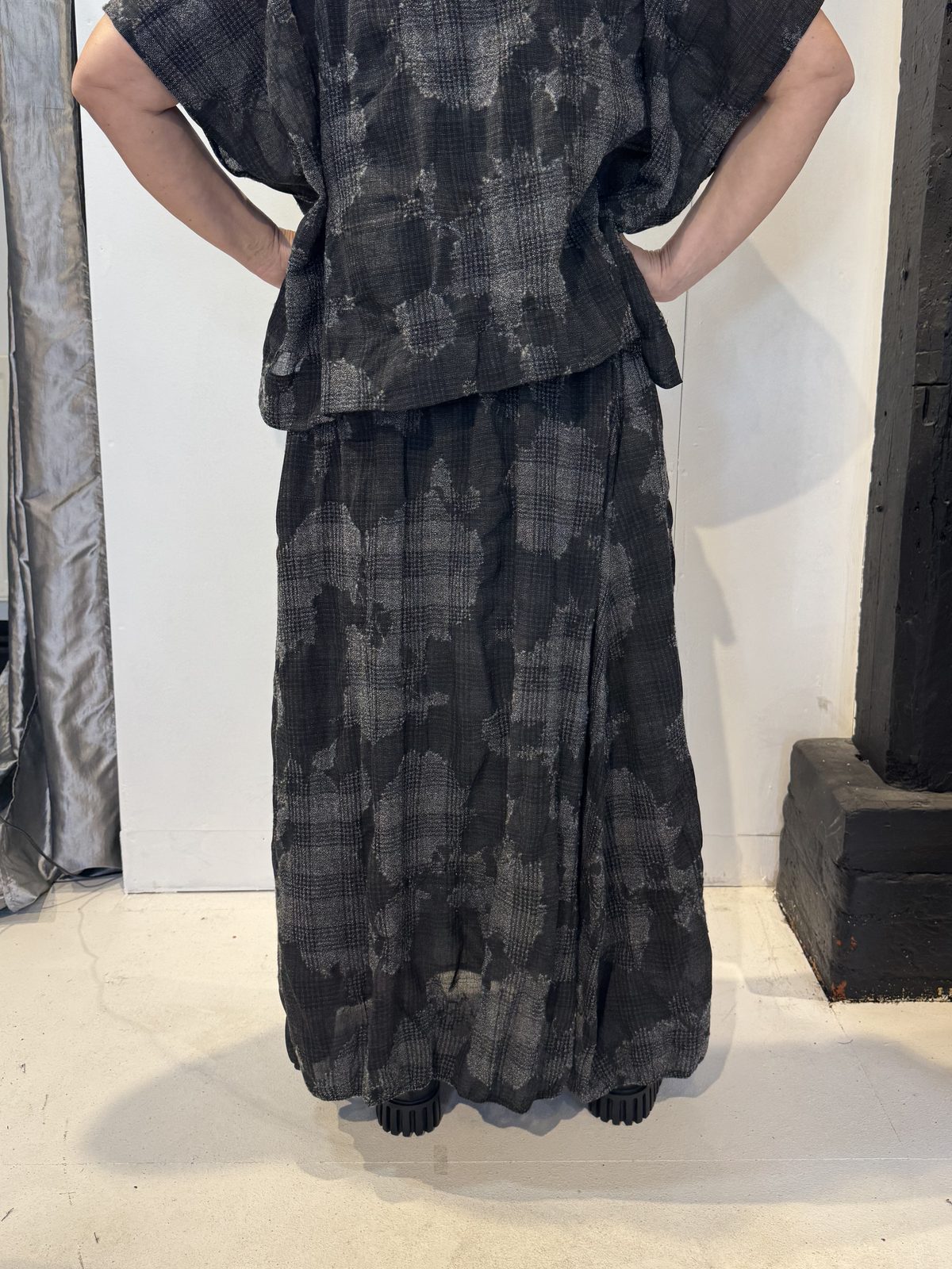 Back view of the Freesia grey and charcoal checked long skirt