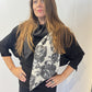 Igor Dobranic Imortelle grey floral scarf draped around the neck with its contrasting charcoal section