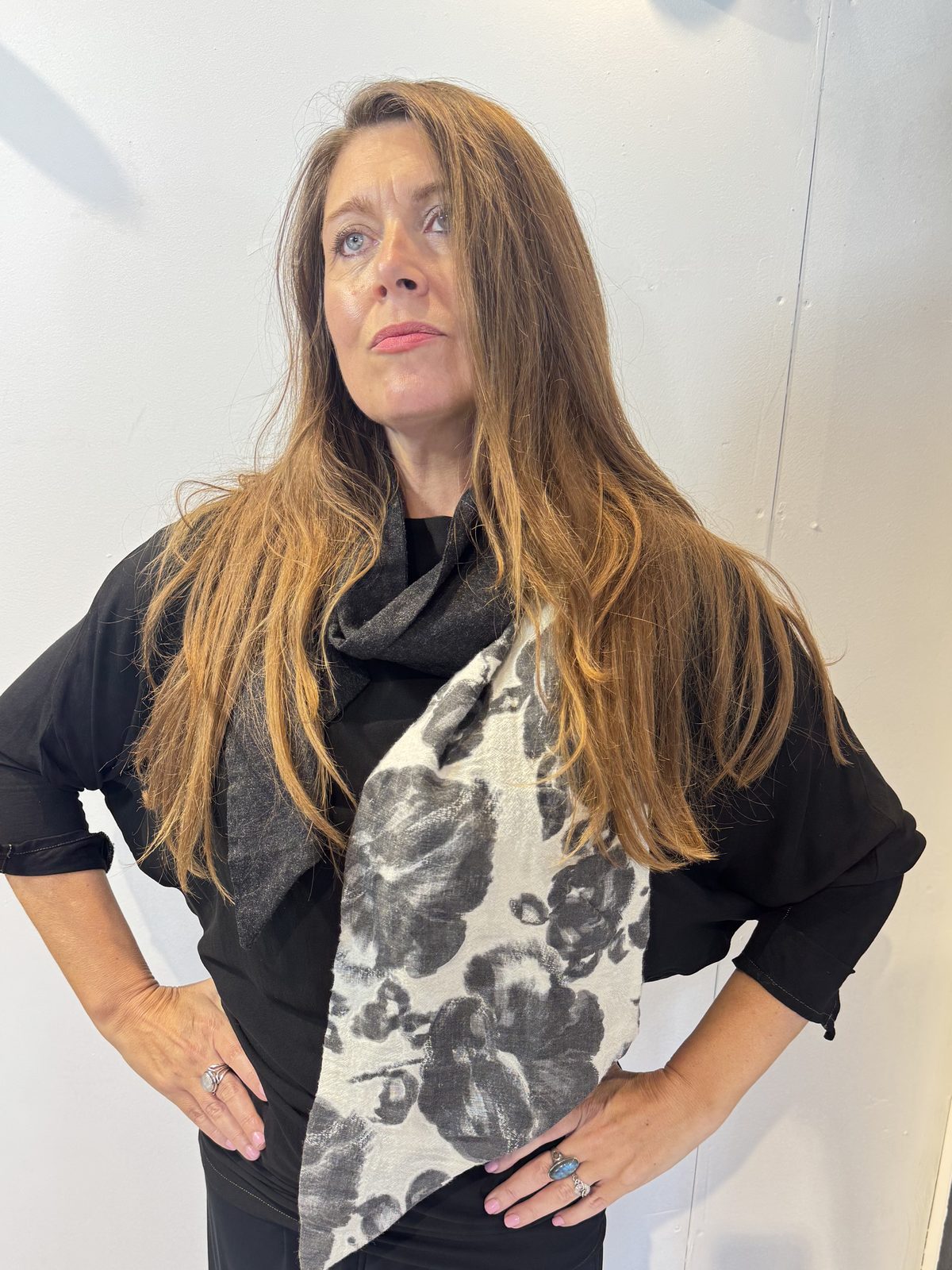Closer view of the Imortelle scarf showing its floral panel and angled end