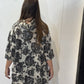 Back view of the Lantana tunic in grey and charcoal florals