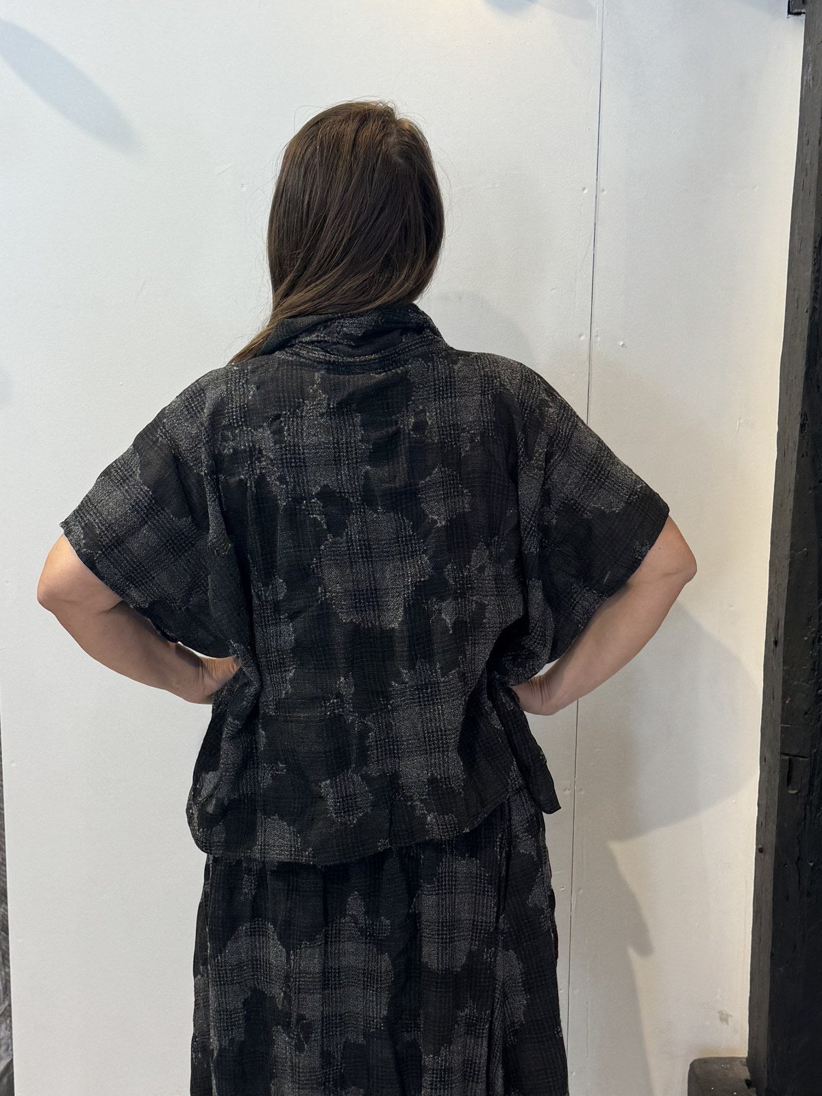 Back view of the Lotus waistcoat in grey and charcoal checks