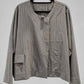 Front view of Igor Dobranic Petunia grey pinstriped jacket with round neckline and patch pocket