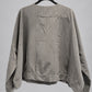Back view of Igor Dobranic Petunia grey pinstriped jacket showing dropped shoulders and broad hem