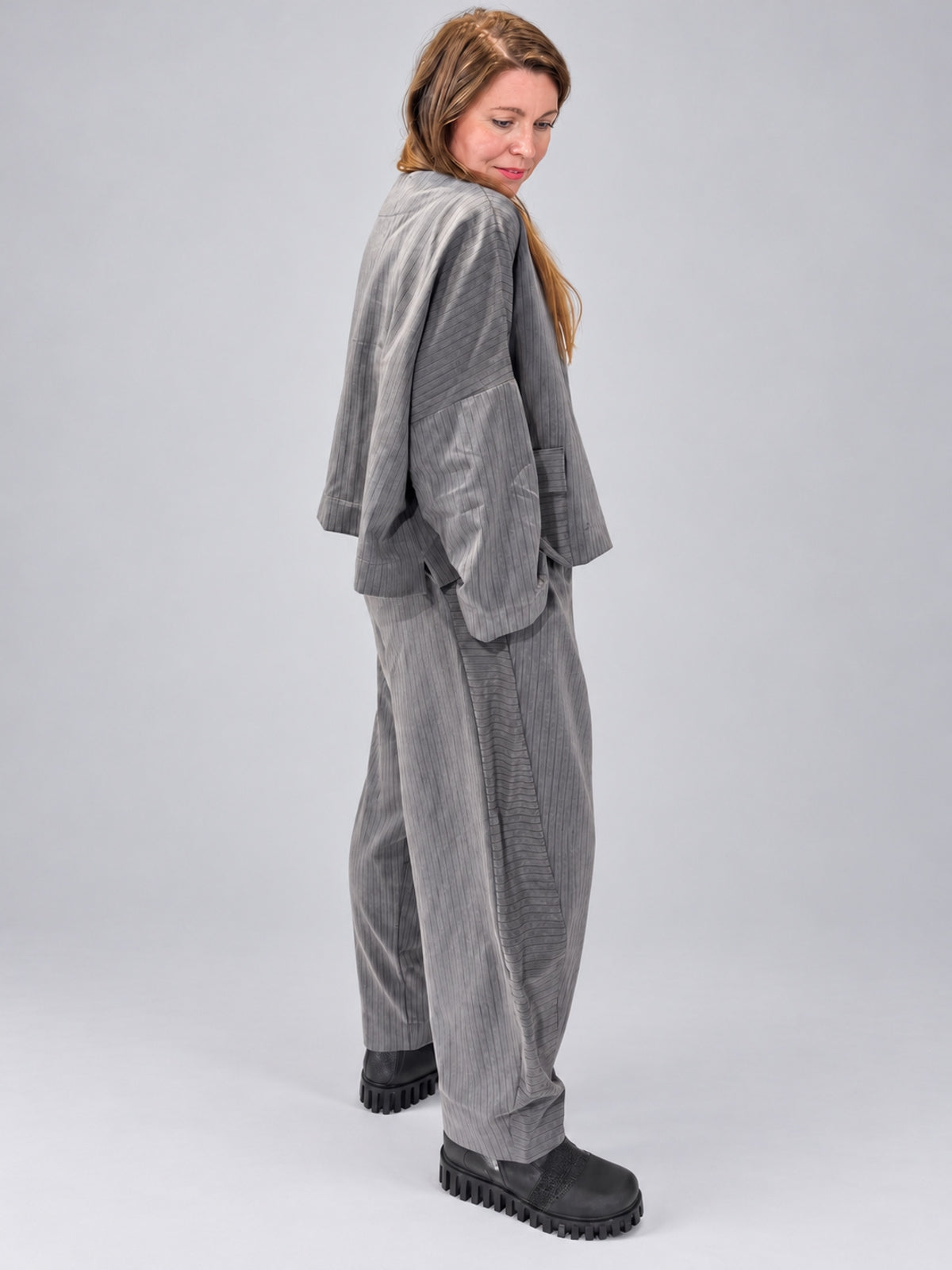 Igor Dobranic Petunia grey pinstriped jacket — rear three-quarter outfit view