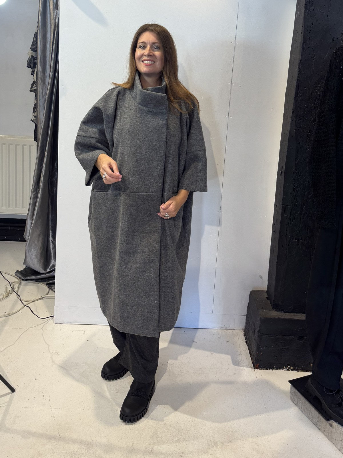 Front view of the Igor Dobranic Sorrel grey coat with its collar raised