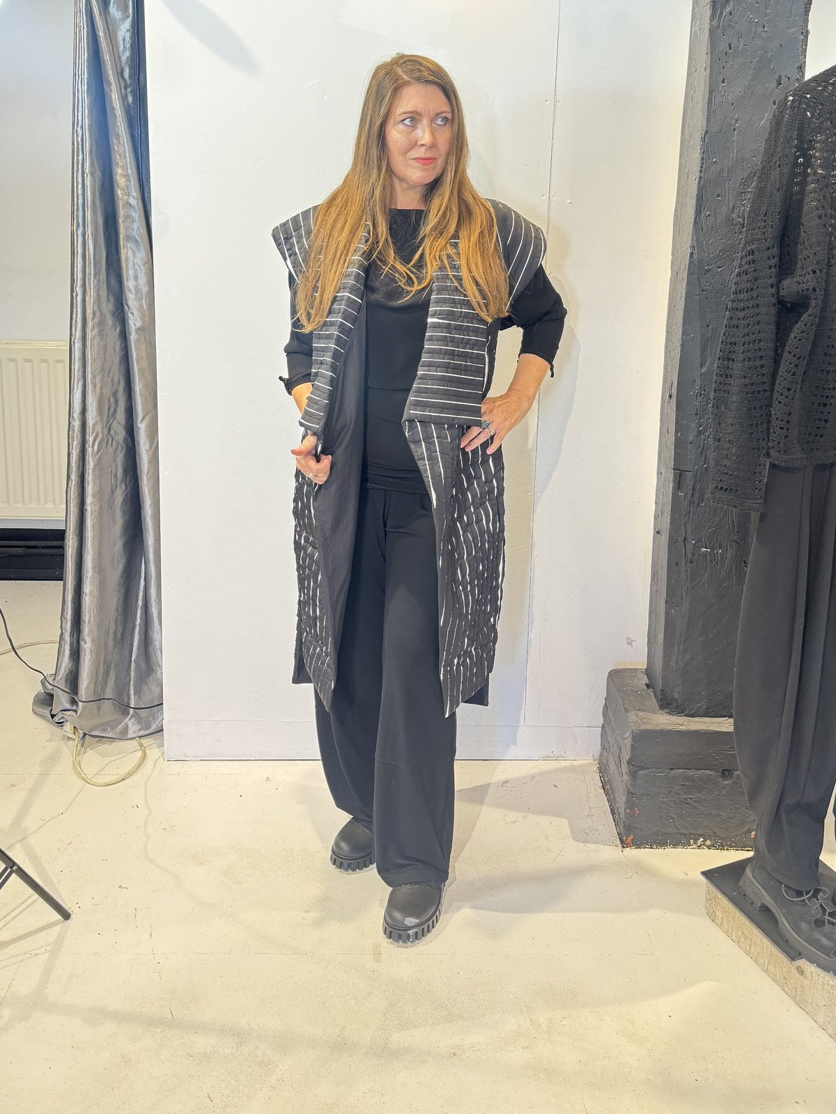 Front view of the Tulip black and white waistcoat worn open, showing its broad lapels