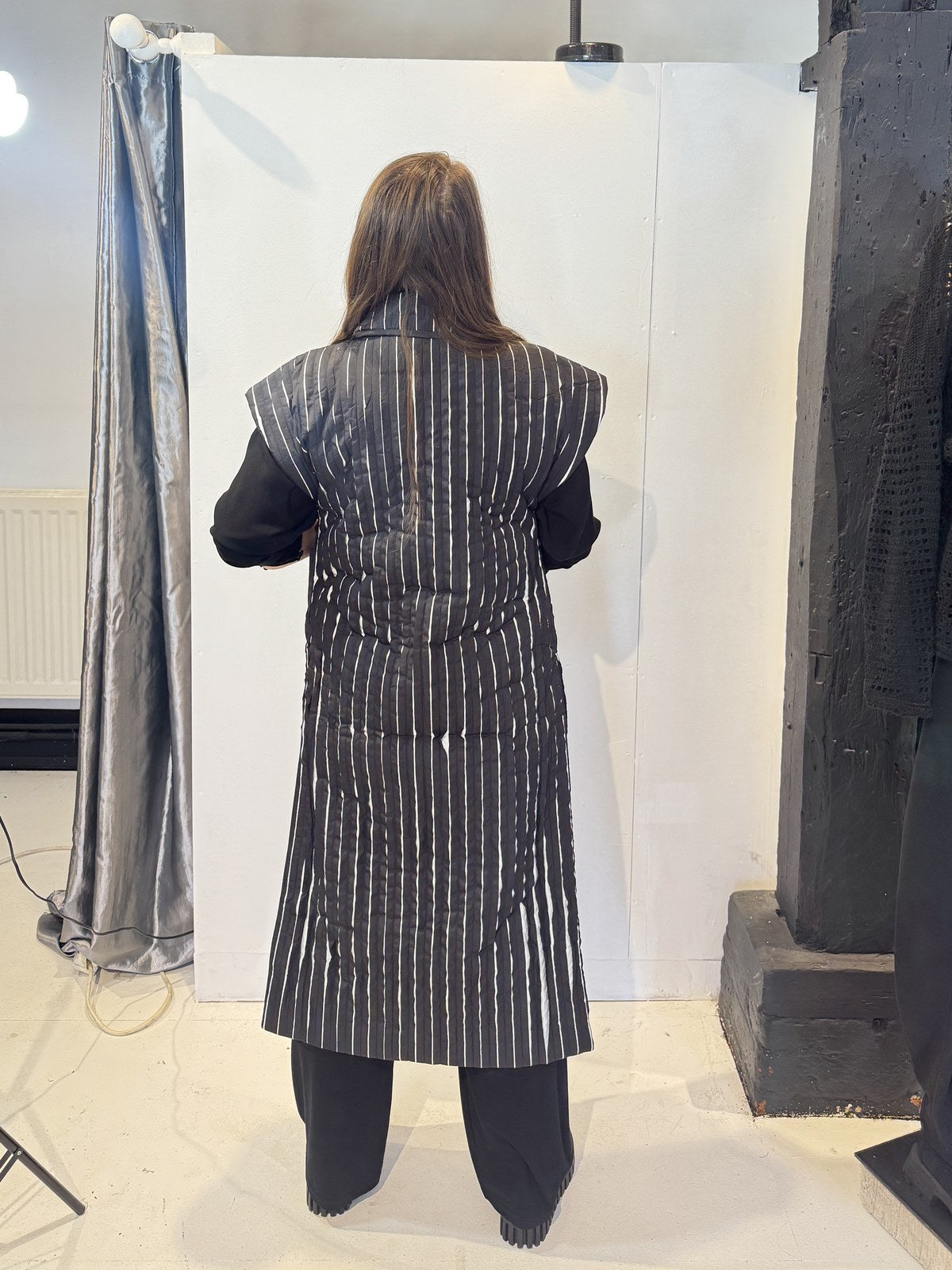 Back view of the Tulip waistcoat showing extended shoulders and vertical white stripes