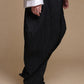 Black crinkle balloon trousers, right side view