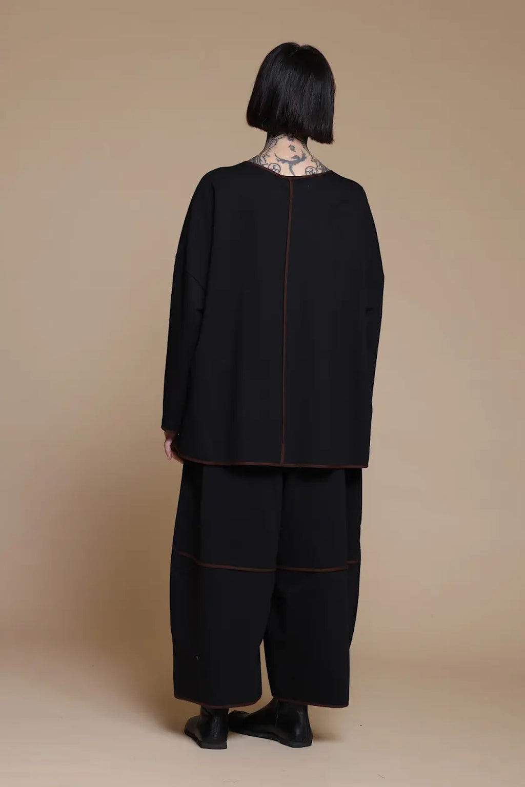 Black contrast-trim top, back view
