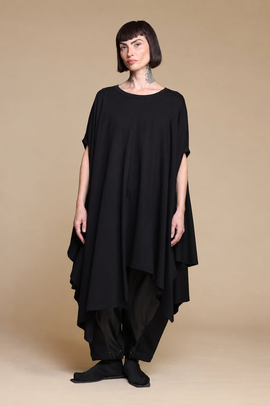Black Kedem Sasson draped top, front view without a shirt underneath