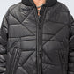 Kedziorek 5501 black long quilted coat — zip and quilting detail view