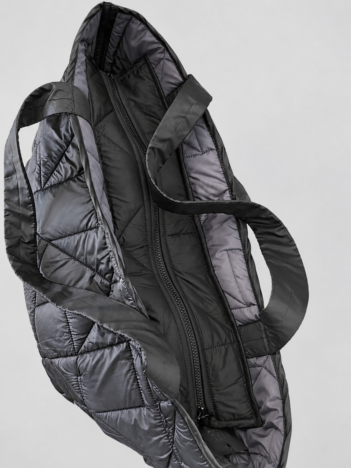 Kedziorek black and grey quilted tote, zip opening and handle detail