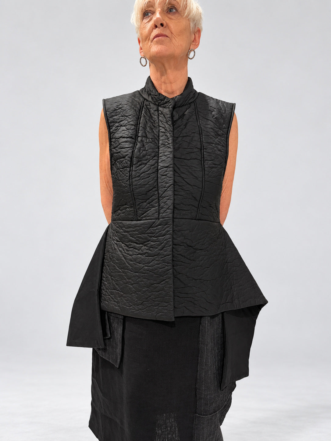 Kedziorek 5511 black asymmetric quilted gilet — main view
