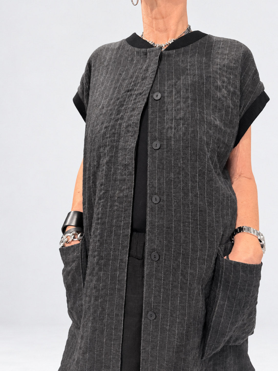 Kedziorek 5524 grey pinstripe long gilet — button and pocket detail view