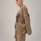Kedziorek taupe floral print top, side view showing dropped shoulder, loose sleeve and hem