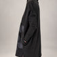 Kedziorek black floral print cotton dress, side view showing pockets and exposed seams