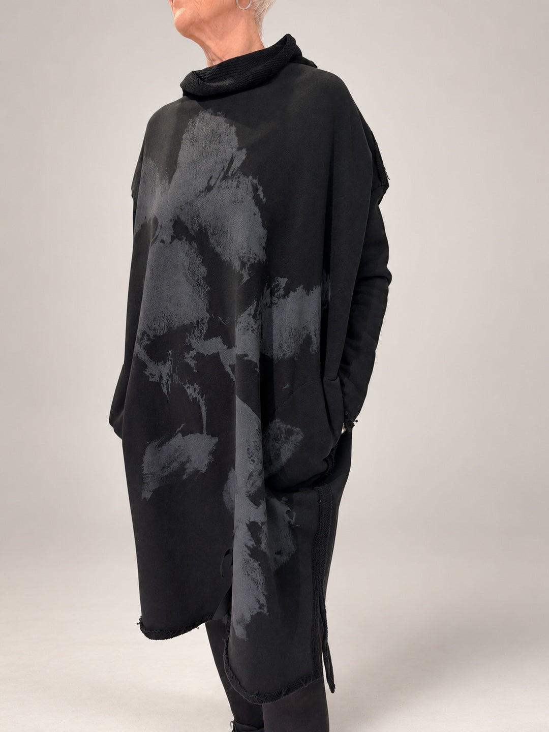 Kedziorek black tonal floral print dress with raised collar, relaxed sleeves and shaped hem, front view