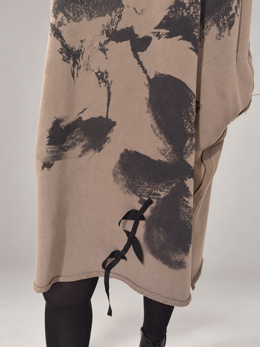Kedziorek taupe cotton dress, close-up of floral print, ribbon leaf detail and raw-edged hem