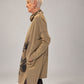 Kedziorek taupe floral print cotton dress, side view showing raised collar and pocket